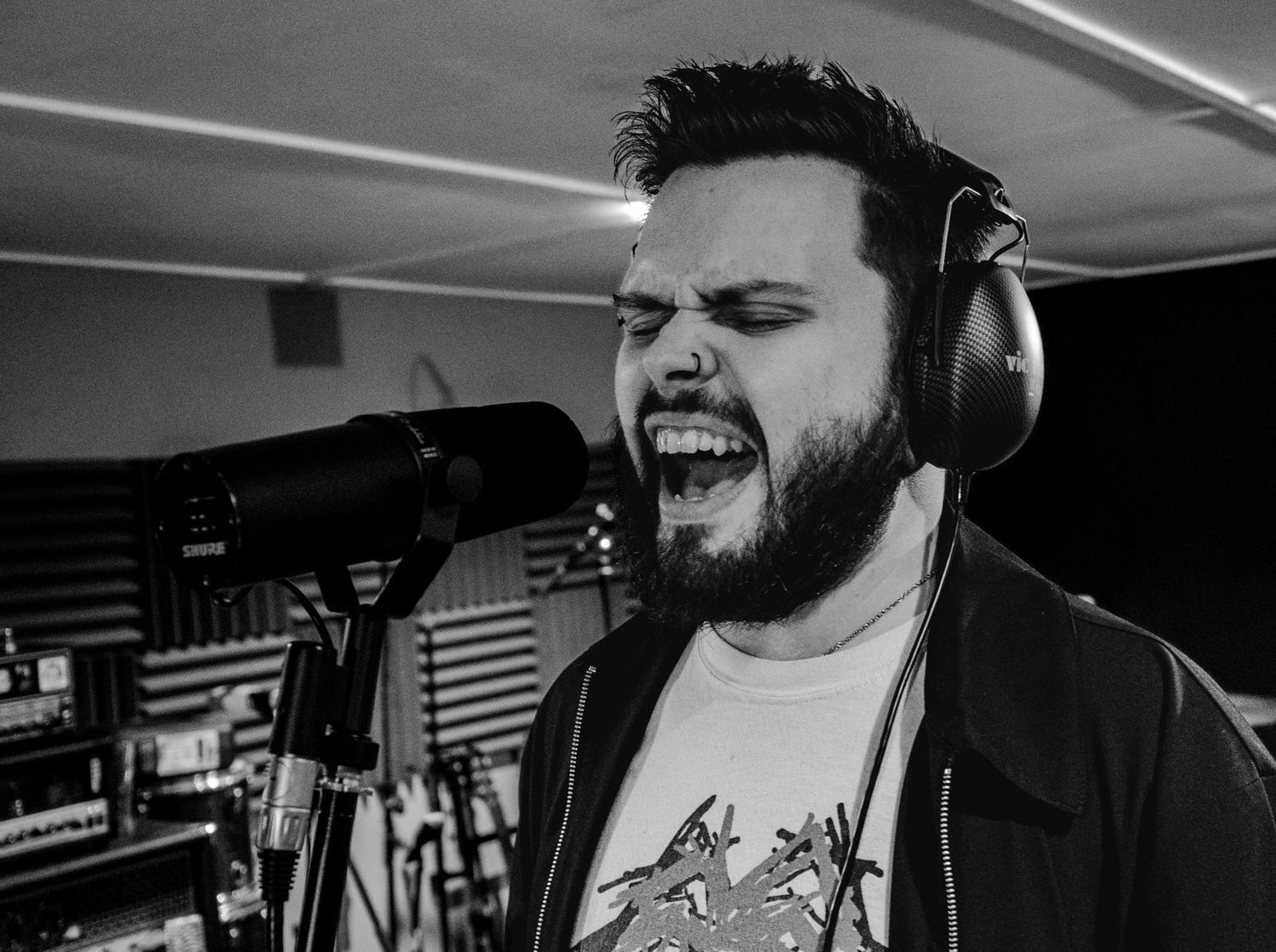 Jim recording powerful rock vocals in studio after Singsmith coaching session